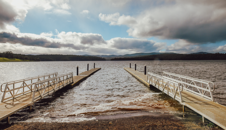 Two boat ramps on a large lake